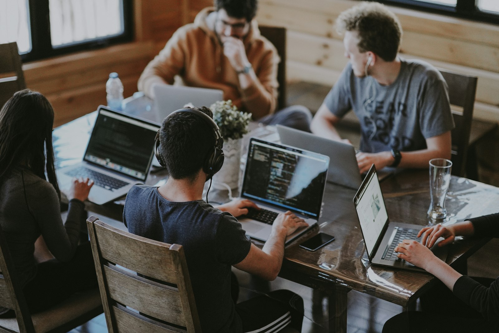 Professional IT team collaborating on software development